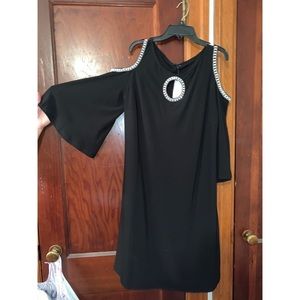 Cold shoulder black dress with jewel accents